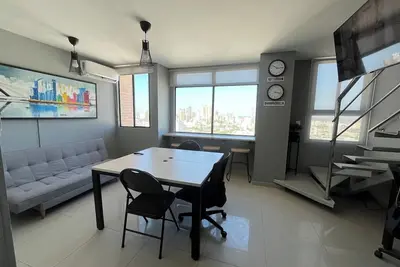 Image de Central Modern Duplex with Panoramic View