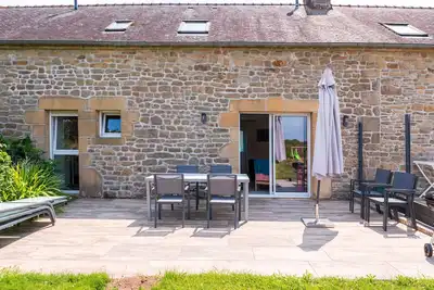 Image de Petite maison 'La Clé Du Bonheur' avec terrasse privée, jardin partagé et Wi-Fi