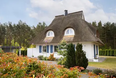 Image de Maison au Bodden avec sauna et vue sur l'eau