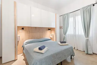 Image de Chambre '40°Parallelo - Ampia Matrimoniale 4' avec Jardin partagé, Wi-Fi et Climatisation