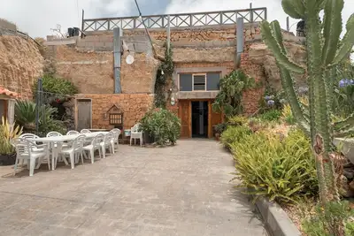 Image de Vacances à la 'Casa Cueva Anajos' avec vue sur la mer, terrasse partagée et jardin privé