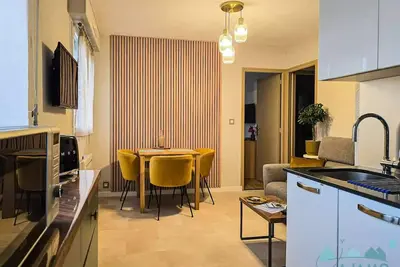 Image de 112- appartement rénové à quelques pas de la grande plage