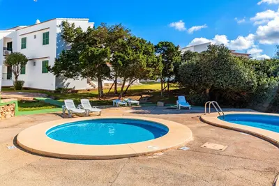 Image de Appartement 'Biniforcat' avec vue sur les montagnes, piscine partagée et terrasse privée