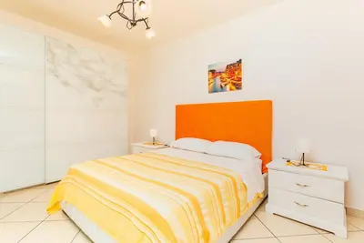 Image de Appartement 'Da Lorenzo Alcantara' avec vue sur les montagnes et Wi-Fi