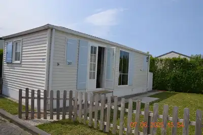 Image de Chalet Harly at Kerlinga campsite within walking distance of the beach and stores.