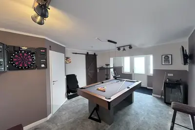 Image de Shed 30 near Hamburg between the seas. Billiards, darts, sauna, very luxurious