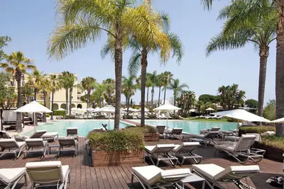 Image de Appartement 'Marina Lake' avec vue sur la mer, piscine partagée et terrasse privée