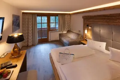 Image de Family room Alpine Lifestyle - Berghotel Madlener
