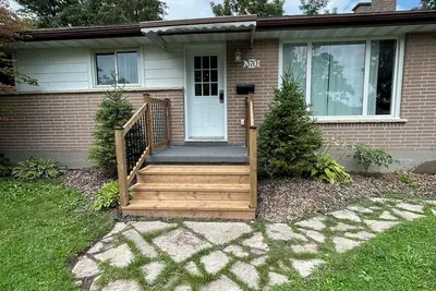 Image de 4-bedroom bungalow in tranquil Peterborough with Ac, and putting green