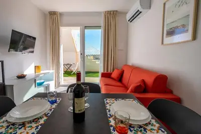 Image de Appartement 'Marzamemi' avec piscine partagée, terrasse et jardin