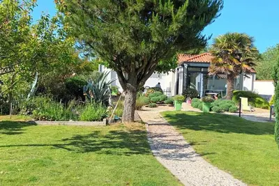 Image de Loue maison 110m2 proximité commerce et mer, parking fermé, véranda pour détente