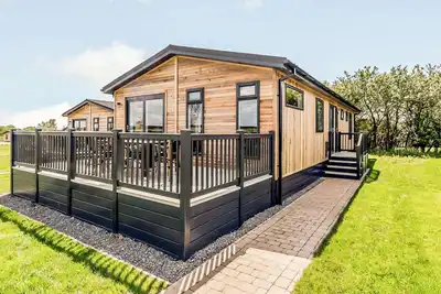 Image de This spacious lodge is perfect for a break away in the English countryside.