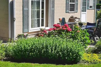 Image de Comfortable 4-person chalet in Groede with garden, complete kitchen and free wifi. Quiet location within walking distance of beach and nature.