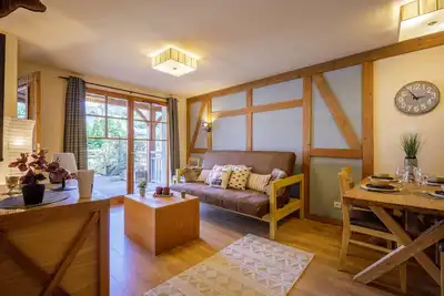 Image de Appartement Prestige au Centre-ville avec Piscine, Sauna et Parking à Saint-Lary-Soulan