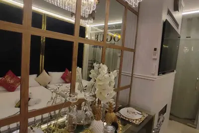 Image de Charming 2-bedroom condo with Cinema Room, Ac, WiFi in wonderful Sm Mall of Asia
