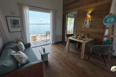 Image de Sunset Cove Overwater Bungalow with Bedroom, Kingbed, Living Room, Kitchen