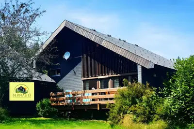 Image de Maison de vacances 'Bernau13, Rechbergblick' avec vue sur la montagne, jardin commun et Wi-Fi