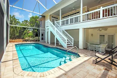 Image de 999 East Gulf Drive 102 - Your Private Sanibel Island Oasis: Steps from the