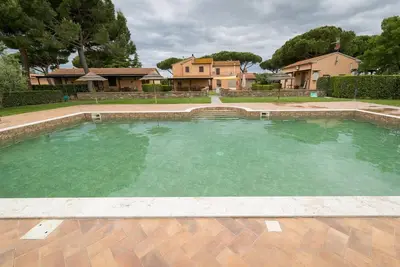 Image de Appartement \"Ginepro\" avec piscine partagée, Wi-Fi et climatisation