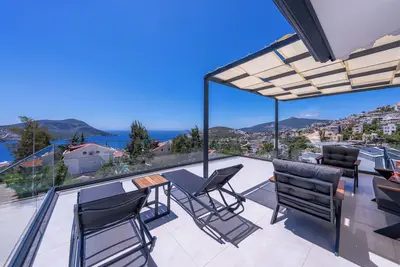 Image de Cozy 3-bedroom, 3-bathroom villa in Kalkan, close to the sea and amenities.