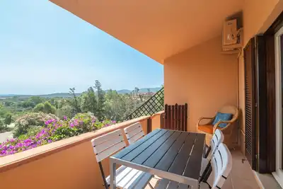 Image de Appartement 'Gli Oleandri Porto Istana' avec vue sur la mer, Wi-Fi et climatisation