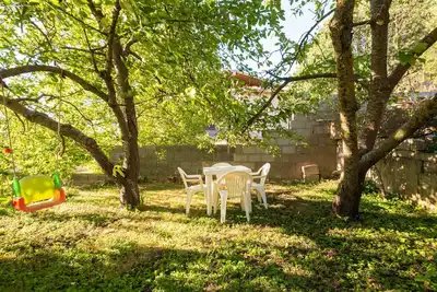 Image de Appartement 'Villanova' avec vue sur les montagnes et jardin privé