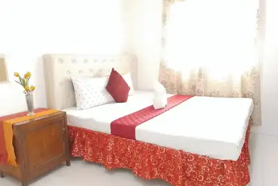 Image de Vacation home at D lucky garden inn 2-bedroom apartment in Puerto Princesa City