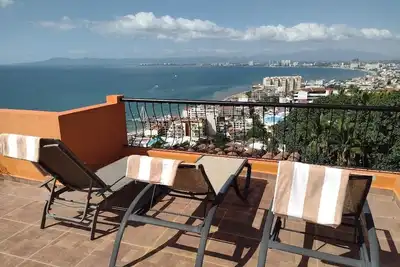 Image de Penthouse suite with palapa, private dipping pool and roof top terrace.