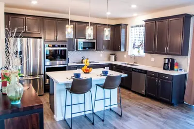 Image de Spacious 6-Bedroom Retreat, Gym + Office