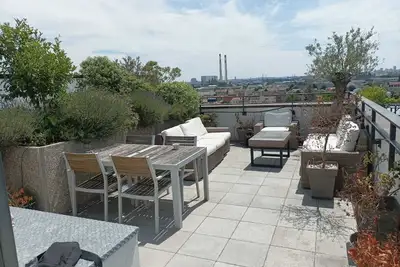Image de Cosy Appartement - Rooftop - Parking - Paris