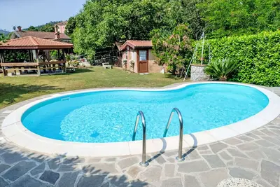 Image de Joli appartement pour 6 personnes avec climatisation, Wifi, piscine privée, Tv, terrasse et parking