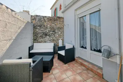 Image de Maison de vacances 'Maison De Famille Paisible' avec terrasse privée et Wi-Fi