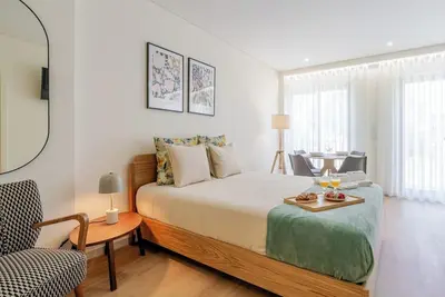 Image de HostWise – Bright Flats with City Views