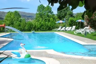 Image de Homerez - Maison confortable avec vue sur la montagne et piscine partagée