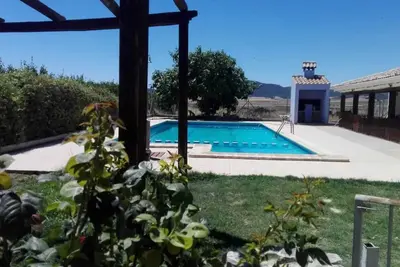 Image de Homerez - Maison avec Jacuzzi et Vue sur les Montagnes à Noguericas