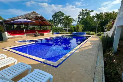 Image de Hermosa y acogedora finca en Restrepo 5 Habitaciones para 20 personas.