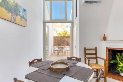 Image de Maison de vacances 'Don Paolo' avec terrasse privée, Wi-Fi et climatisation