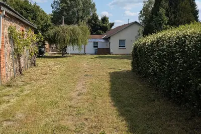 Image de Maison de vacances 'Haus Im Grünen' avec terrasse privée, jardin partagé et Wi-Fi