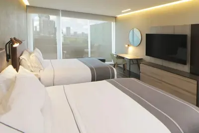 Image de Find Relaxation and Comfort in a Vibrant Guadalajara Room - 3 Units