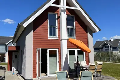 Image de Vacation home Perlebucht - Exclusive vacation home with fireplace, sauna and sunny terrace