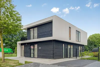 Image de Enjoy luxury in the vacation villa Moon: 8-person villa with whirlpool, sauna and terrace by the water. Modern and spacious, ideal for a relaxing vacation!