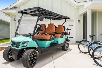 Image de Walk2Beach & PoolsGolf CartFamily Perks
