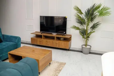 Image de Lovely apartment with WiFi in vibrant Kampala with a cozy and calm environment.
