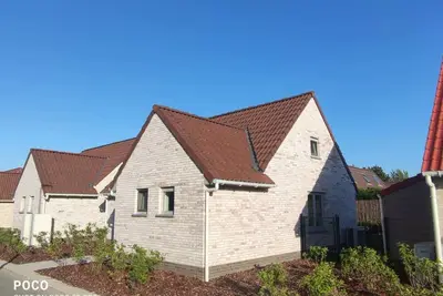 Image de Vacation home Polderhuis10, air conditioning and heating in all rooms, parking and garden
