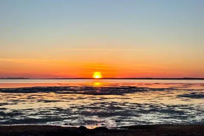 Image de Blooming Point home on Tracadie Bay with sunset views of the National Park Dunes