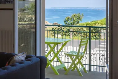 Image de Maison de vacances 'Ty Porz Mouzic' avec vue sur la mer, jardin privé et Wi-Fi