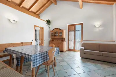 Image de Appartement \"Appartamento Red Star\" avec vue sur les montagnes, jardin partagé et Wi-Fi