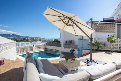 Image de Beachfront villa for 6 in Nerja Punta Lara with private pool, sea and garden views. Mountain view