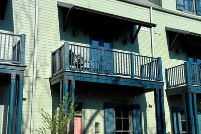 Image de Group travel & family vacation home destination with a pool, balcony and cabana.