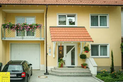 Image de Appartement 'Marita Sigg' avec terrasse privée, jardin partagé et Wi-Fi